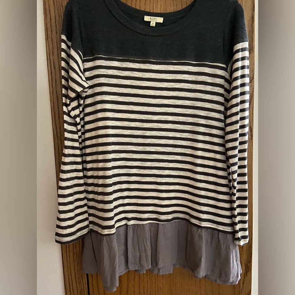 Grey and oatmeal colored stripped top with peplum bottom solid gray! Size small